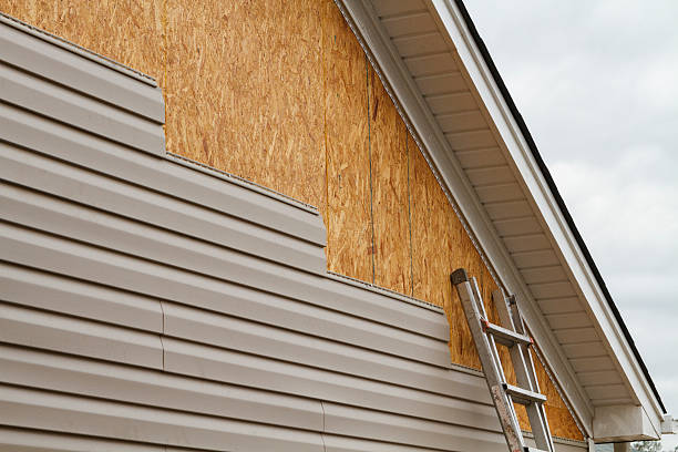 Professional Storm Damage Siding Repair technician working in Happy Valley, OR